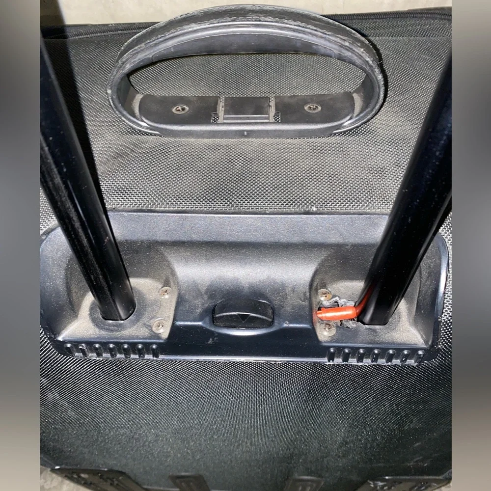 TUMI Check On Suitcase